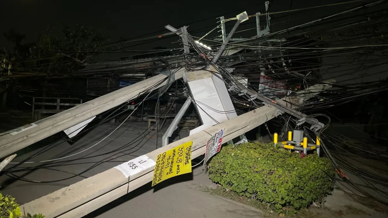 Toppled power poles and damage along Sukhumvit Road in Samut Prakan after truck hits cables near Bang Pu Industrial Estate