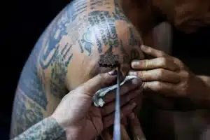 Thai man’s sacred tattoo test leads to axe injuries | Thaiger