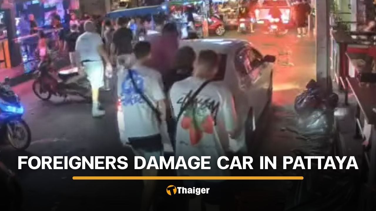Foreigners jump on moving car and damage it on Pattaya road | Thaiger