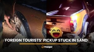 Foreign tourists’ pickup stuck in sand at Phang Nga beach | Thaiger