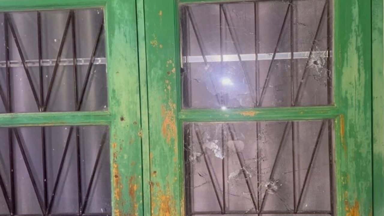 CCTV captures gunmen firing at a house in Phatthalung, showing damage to glass and walls