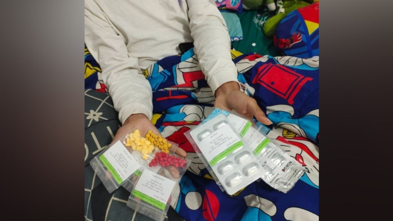 Injured Thai student rests at home after being hospitalised for muscle strain caused by excessive punishment