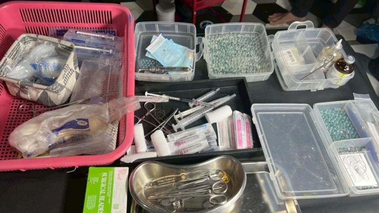 Seized medical equipment including pearl beads, filler injections and surgical blades from illegal clinic in Chon Buri