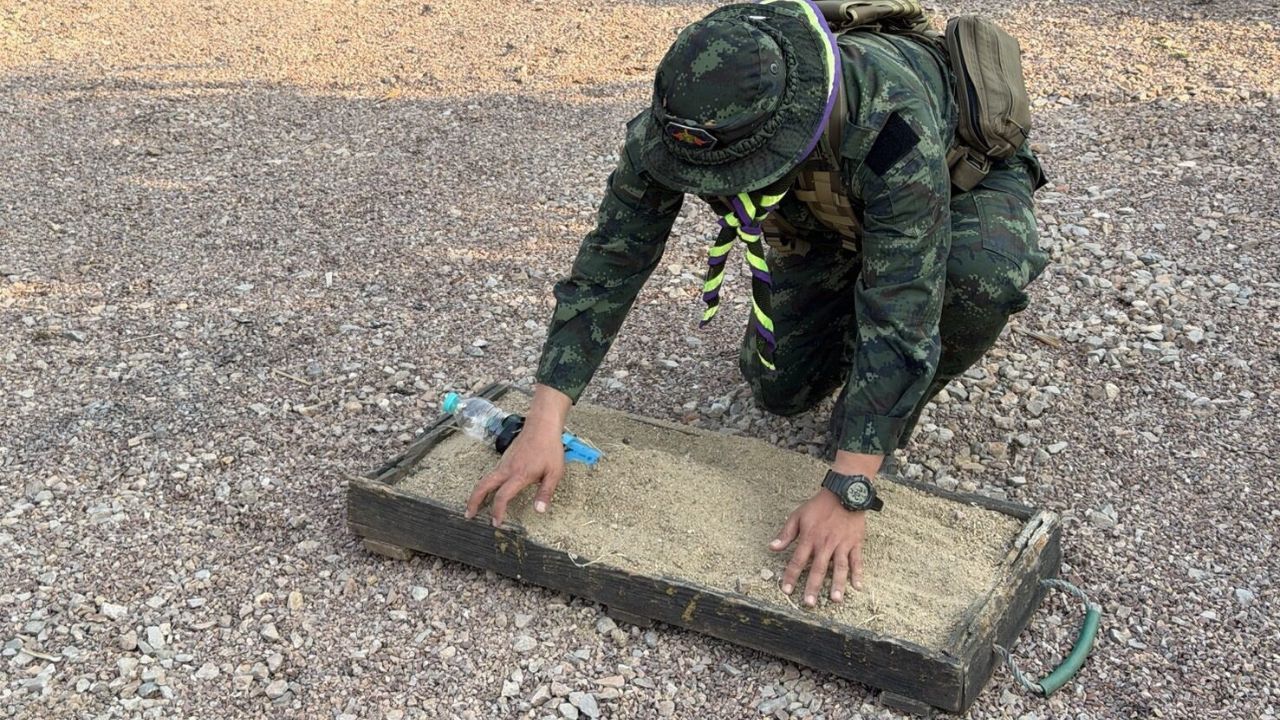 Thai soldiers inspect residential property in Mae Sot after explosive drone was found