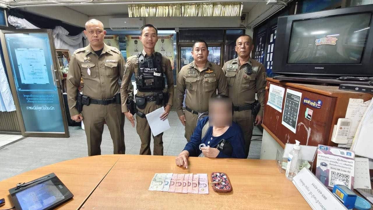 Police officers respond to theft incident at Mae Faek Sunday Market in Chiang Mai