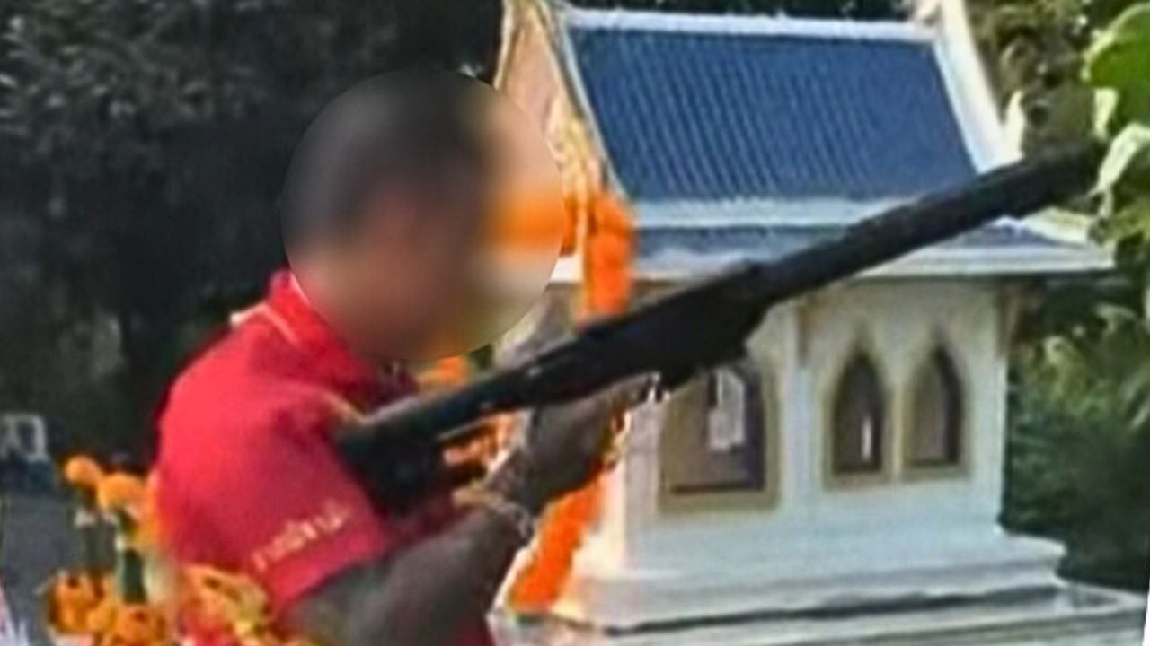 Screenshot from a video shows a man firing a rifle on private property in Suphan Buri.