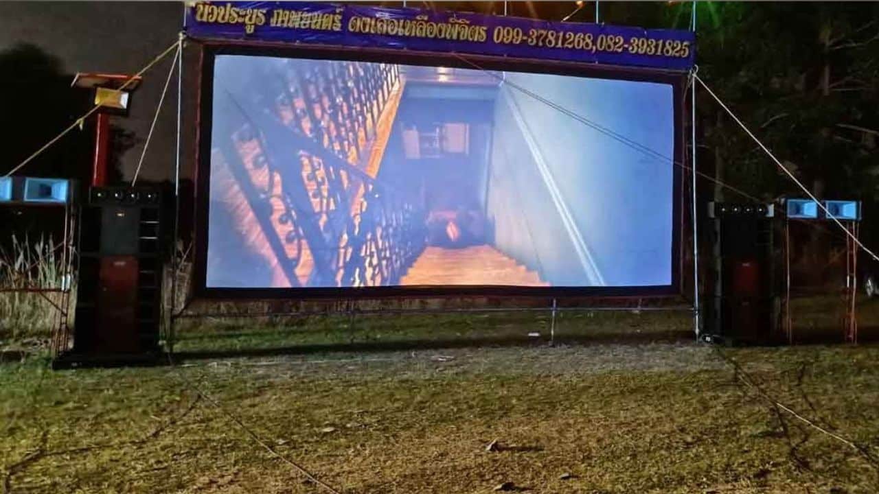 Phichit cemetery screens films for ancestors on Chinese New Year