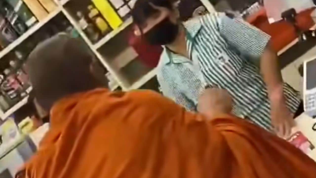 Thai monk buys beer at 7-Eleven