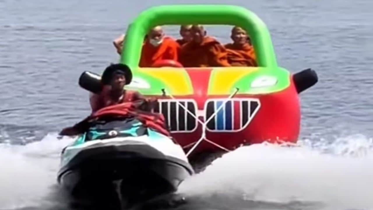 Monks ride banana boat