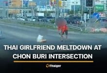 Chon Buri woman sits on road and throws shoes after argument with boyfriend | Thaiger