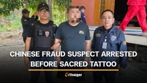 Chinese fraud suspect caught after trying to hide with sacred tattoo | Thaiger