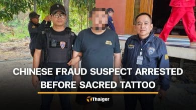Chinese fraud suspect caught after trying to hide with sacred tattoo | Thaiger
