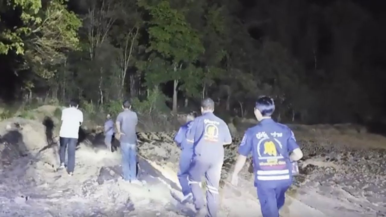 Chon Buri rescuers began a missing woman search after a witness said two men carried a woman into the hills, then returned without her.
