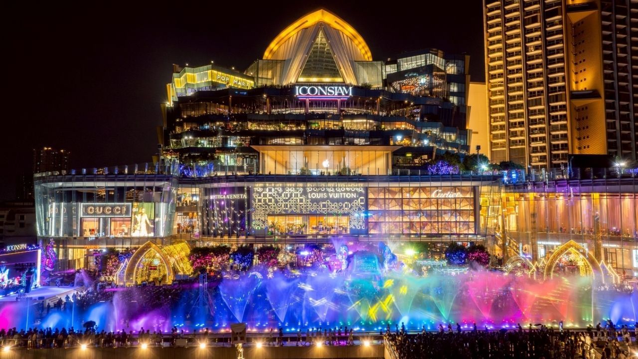 Visitors enjoying traditional Thai rituals during the ICONSIAM THAICONIC SONGKRAN 2026 celebration.