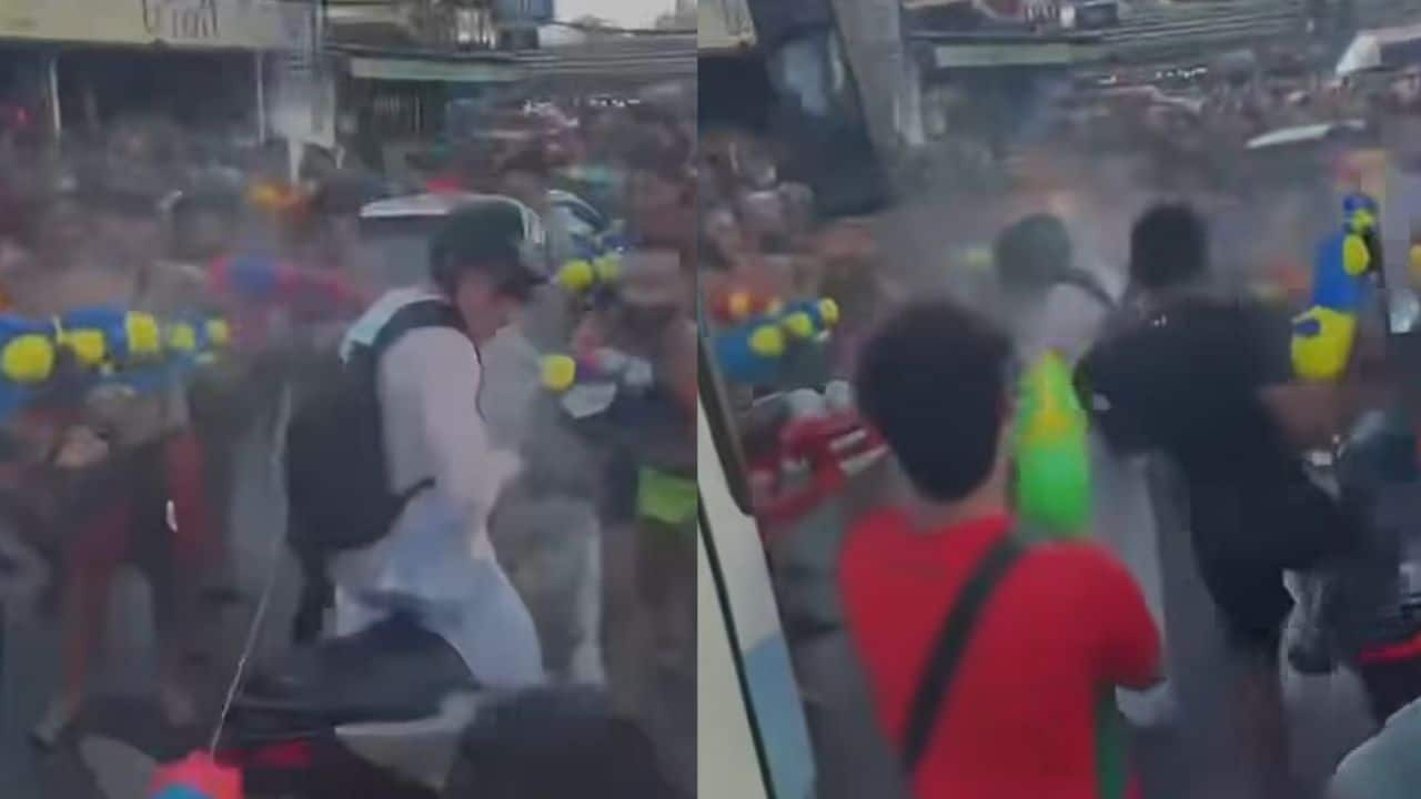Foreigners harass passing motorcyclist during Phuket Songkran