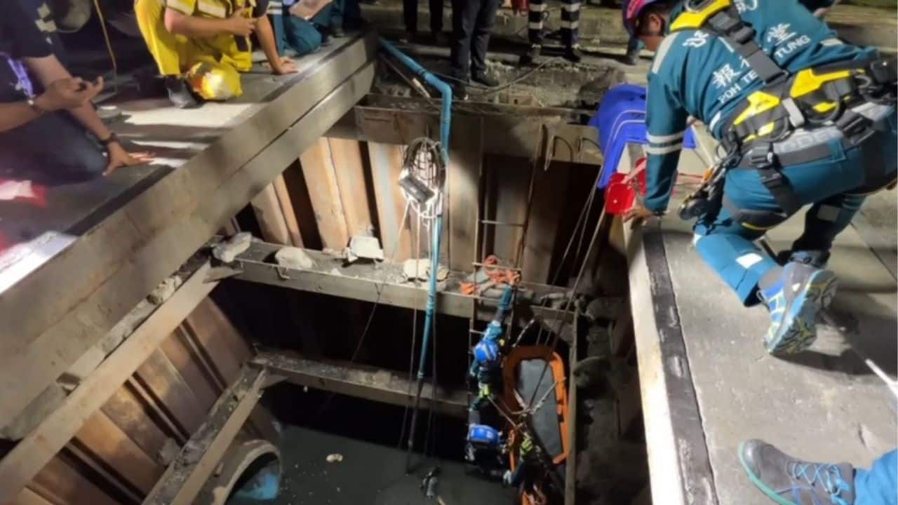 A motorcycle plunged into a construction pit in Nonthaburi, injuring two people before rescuers pulled an unconscious woman from below.