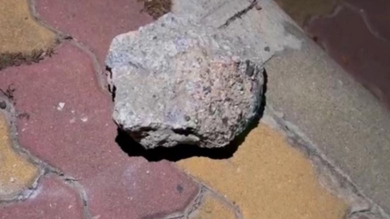 Police detained a homeless man in Pattaya after two bar owners were injured in a reported stone attack on their motorbike.