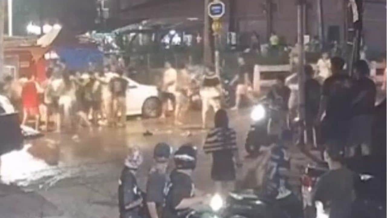 A student was taken to hospital after a bottle struck her during a Songkran brawl in Udon Thani, despite not being involved in the fight.