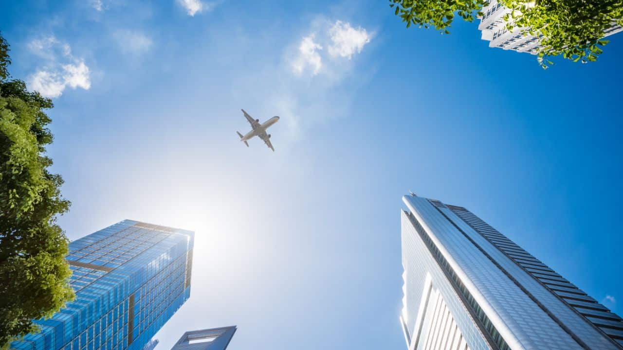 Stock image of a plane in the sky