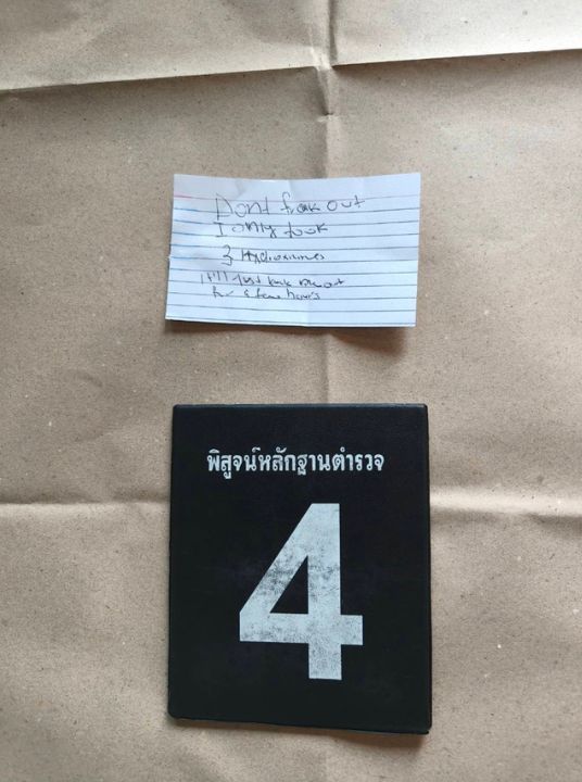 A foreign woman was found dead at an Ekkamai condo after falling from the 11th floor, with police reviewing a note left on her bed.