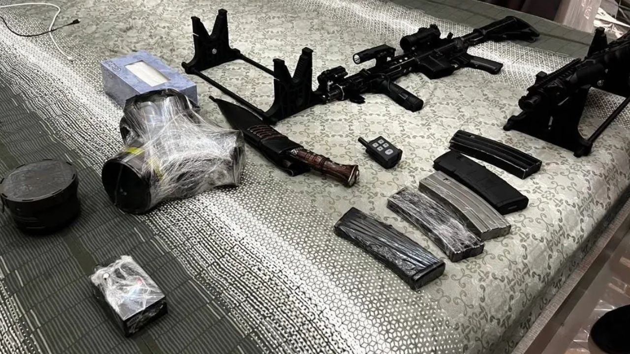 Chinese man found with military weapons