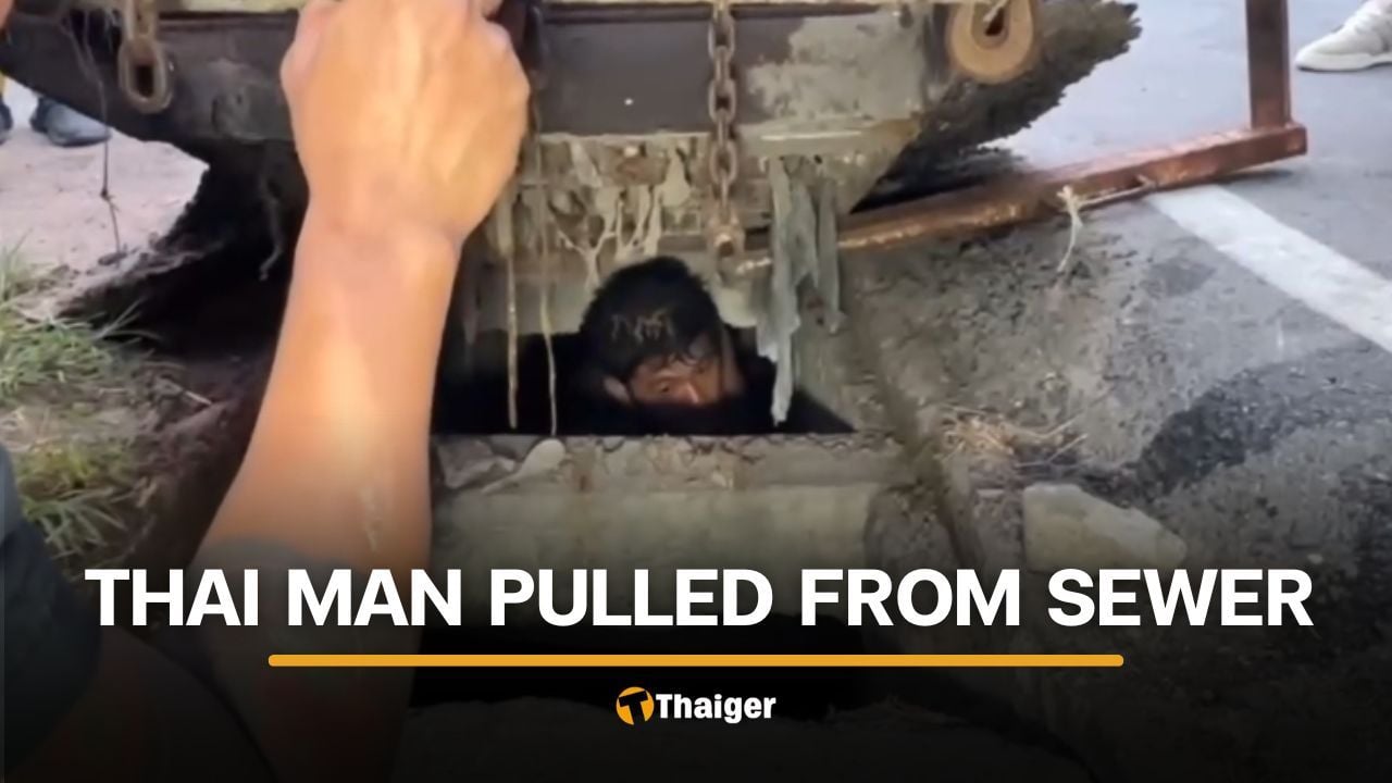 Rayong man removed from manhole after passerby hears cries for help | Thaiger