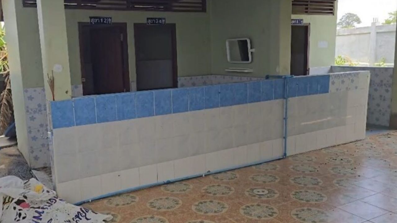 Police are working to identify a man found dead in a school toilet in Buriram, just days before students return for the new term.