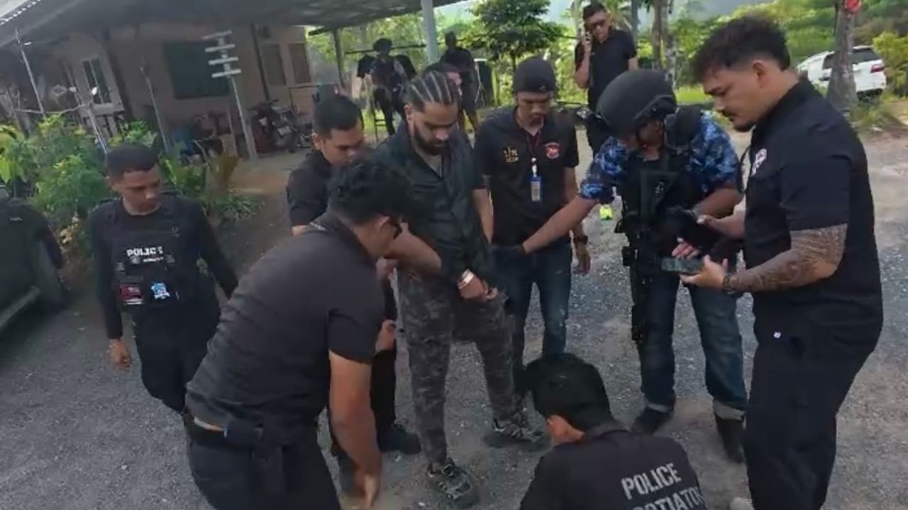 Police arrested an Indian man on Koh Pha Ngan after gun videos led officers to drugs, alleged drug menus, and an overstay charge.